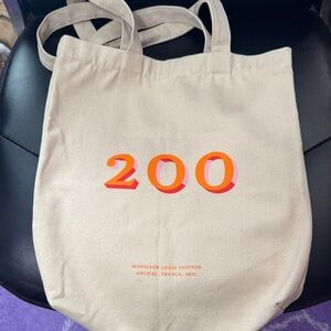 Louis Vuitton Fondation Tan Tote with Orange and Red Accents